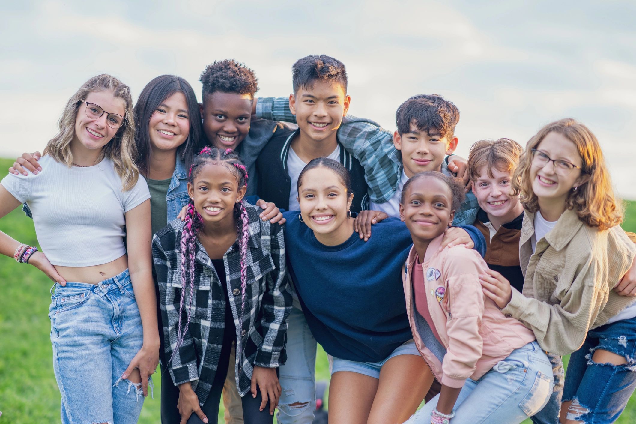 diverse youth empowerment, smiling teens, career development, nonprofit, modern, bright