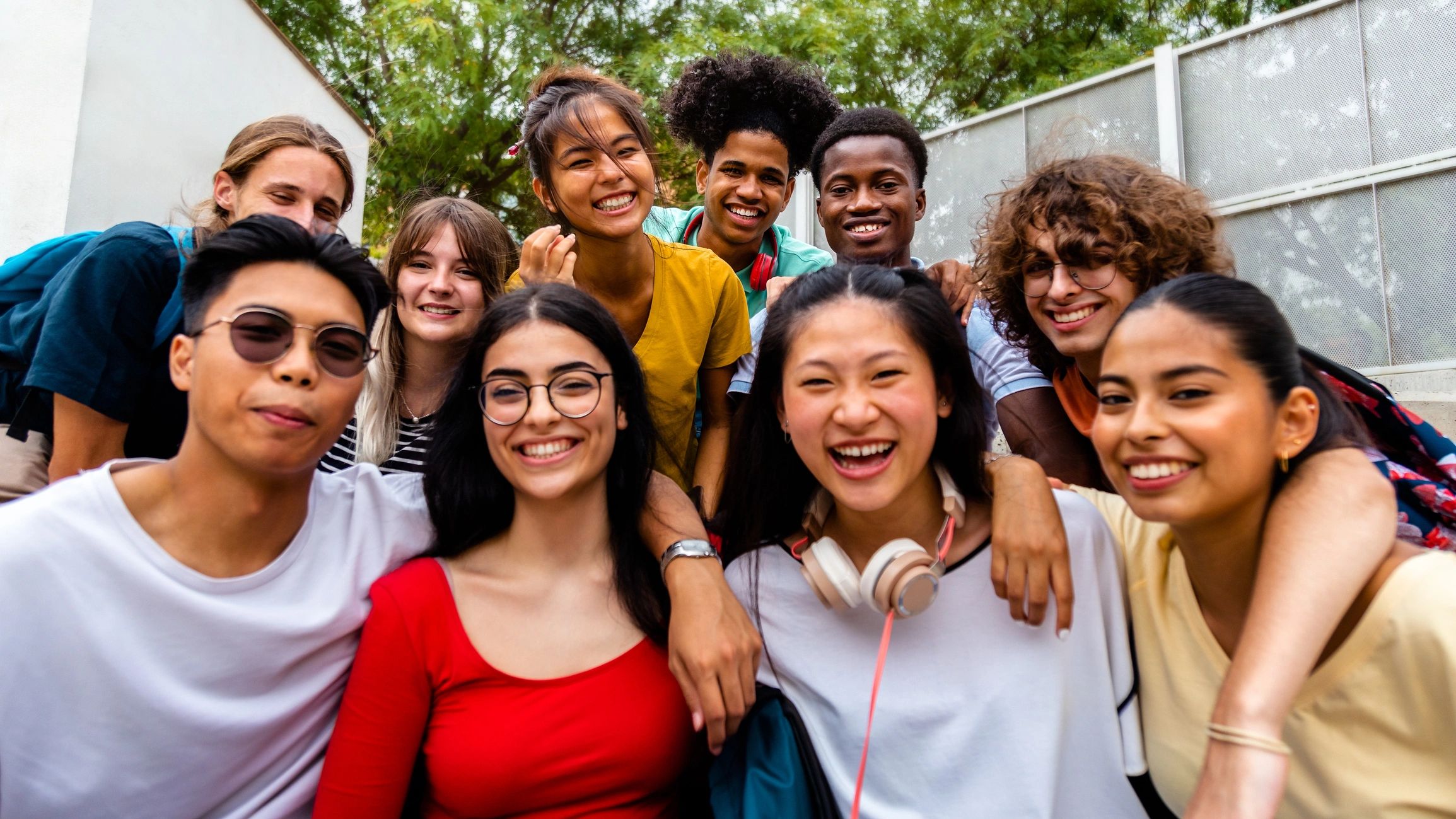 diverse youth empowerment, smiling teens, career development, nonprofit, modern, bright