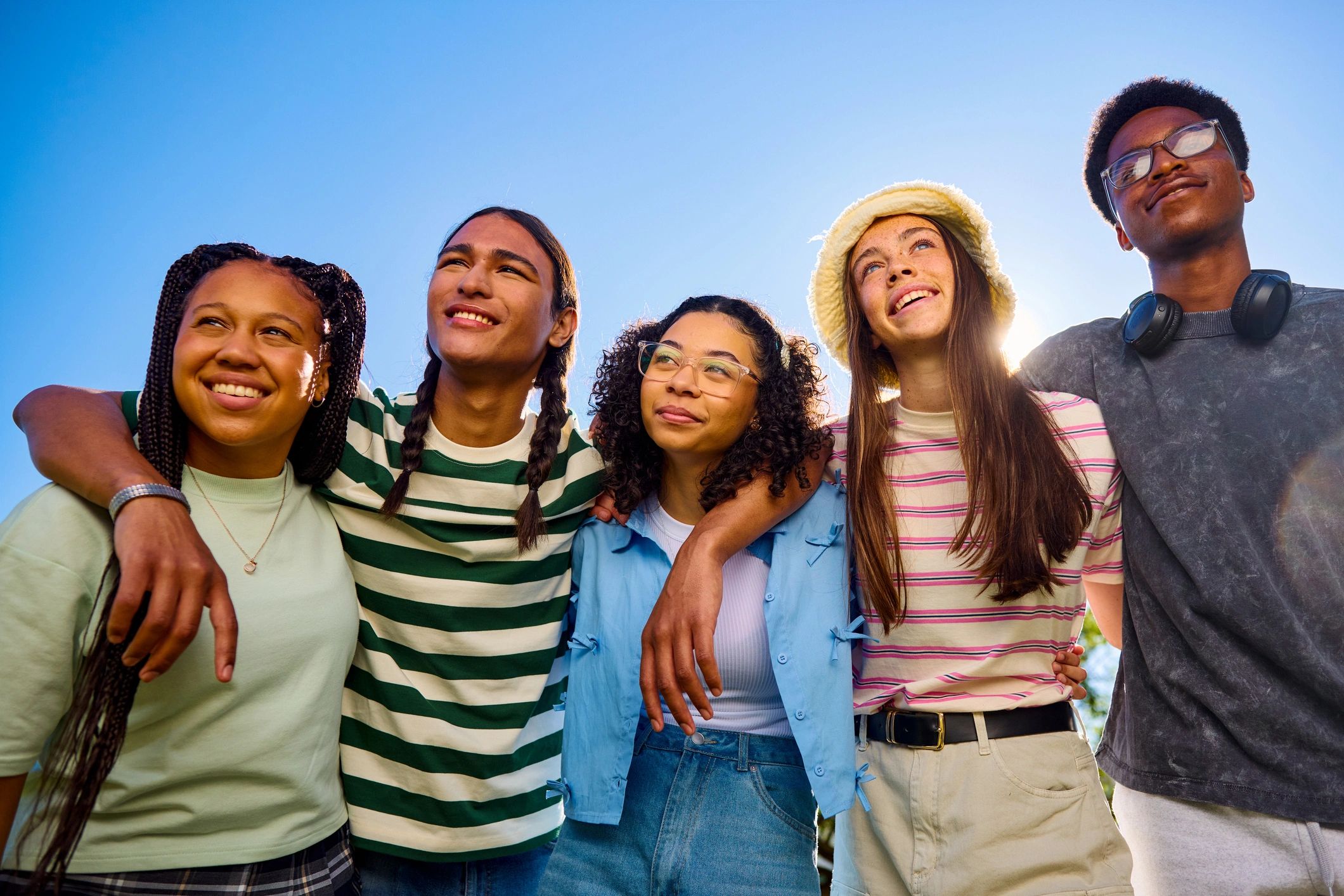 diverse youth empowerment, smiling teens, career development, nonprofit, modern, bright